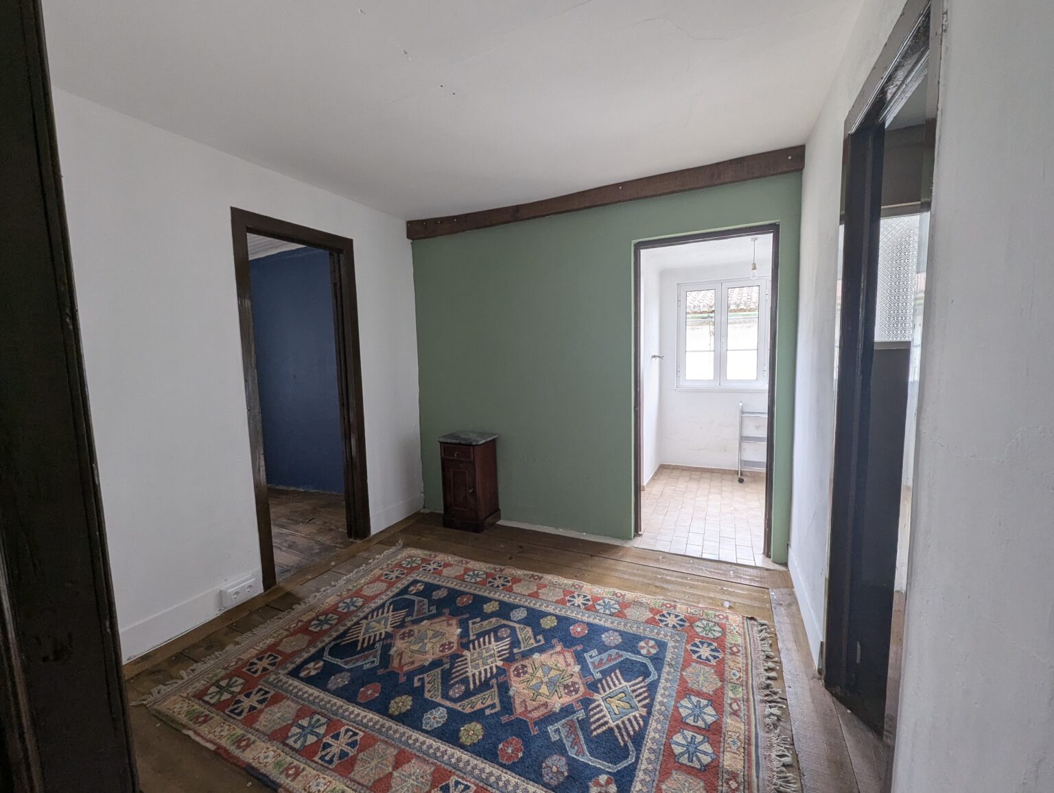 Interior of Casa da Tulha with traditional wooden floors